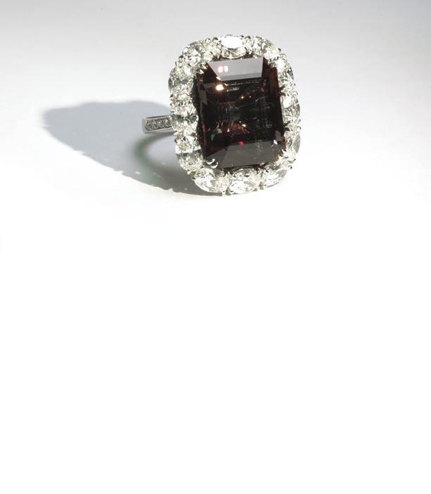 Kazanjian Brothers creates this exceptionally rare large cushion cut natural Alexandrite ring with diamond accents mounted in platinum.