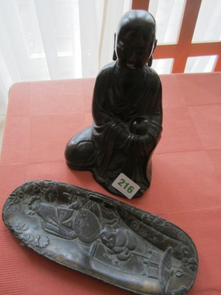 Oriental figurine of a Buddha