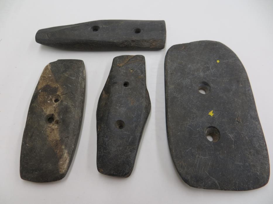 Figure 3: Slate gorgets, courtesy of the Portage County Historical Society In 1972, Dr. Orrin Shane at Kent State University in Kent, Ohio used the site as a field school. Dr. Shane was unable to find a copy of Dr.