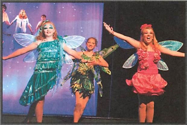 have an extra accessory or two to distinguish herself from the rest of the group. TINKER BELL Begin with a green dress or green t-shirt and shorts as the base of the costume.