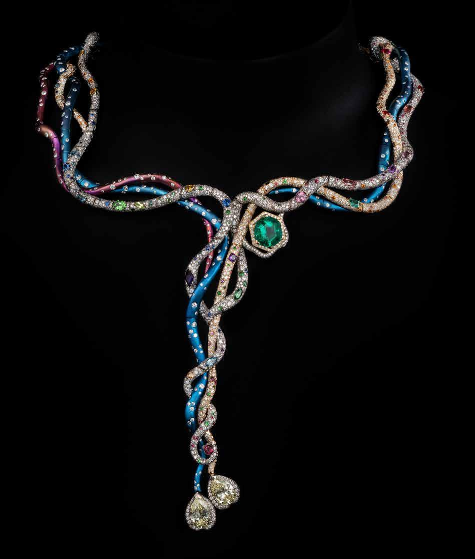 TAP HERE TO VISUALISE THE BEAUTY OF THE TITANIA NECKPIECE IN FULL ACTION TITANIA Neckpiece in 18K white and yellow gold, pink and blue titanium, and set with brilliant-cut diamonds (39 carats), 2
