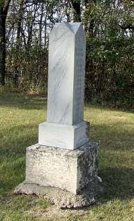 Marble. You will see a few exceptions to use of granite in marble markers located in the north section of the cemetery.