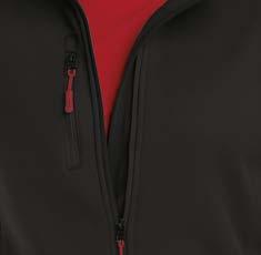 This easy care garment features side panels with concealed zippered side pockets, a