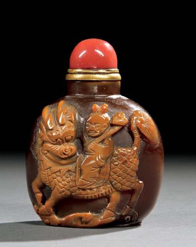 $500-700 30 Cameo Agate Snuff Bottle with a Boy, China, 18th/19th century, flattened round form with straight neck, resting on a short foot, decorated on one side with a boy holding a ruyi scepter on