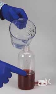 Close the bottle and shake gently to obtain a homogeneous solution.