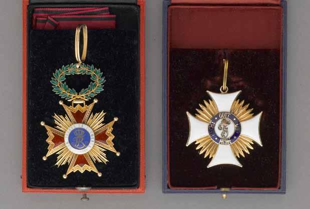 4385 4385 A lot of two cased gold decorations with Imperial Russian attribution Comprising: 1) A gold Wurttemburg Order of Friedrich, Commander s neck badge, with maroon velour and silk-lined blue