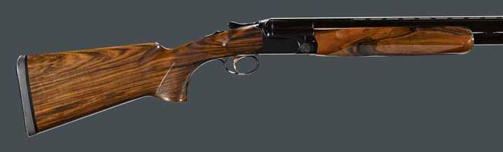 4472 4468 ƒ A cased 12 gauge Perazzi Mirage over/ under shotgun Serial no. PU88197, 12 gauge. Blued 28 1/2 inch barrels with matte, vent rib; two white beads; choke tubes. Ejectors.