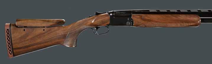 4477 4473 ƒ A cased 12 gauge Perazzi MX8 over/under shotgun Serial no. 89638, 12 gauge. Blued 27 1/2 inch barrels with matte, vent rib; choke tubes. Ejectors. Non-automatic selector safety.