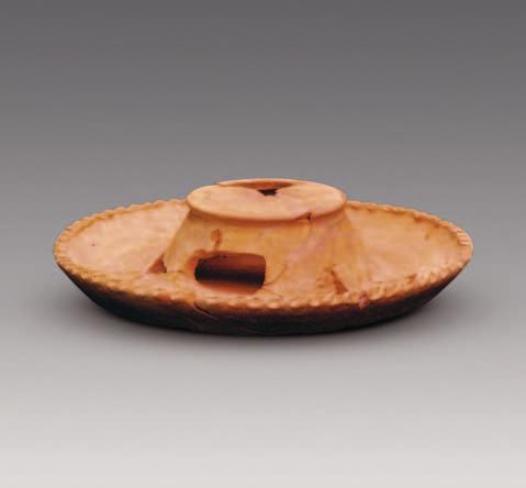 Shaanxi Provincial Institute of Archaeology Figure 3. Potter s Wheel (H402:2, Banpo IV Culture) Figure 4. Cinnabar-painted Human-face Sculpture (H784:1, Miaodigou Culture) Figure 5.
