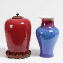 Porcelain with copper red. Gourd vase with peach blossom glaze. Underneath blue Kangxi mark and possibly from the period. H.16cm. Willow leaf bottle with peach blossom glaze.