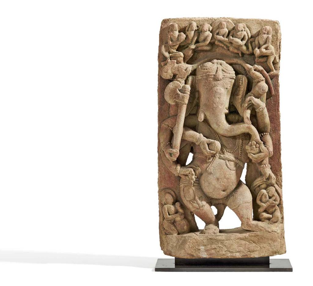South East Asia 2136 DANCING GANESHA. TANZENDER GANESHA. Central India. 10th c. Sandstone with residue of red pigment.