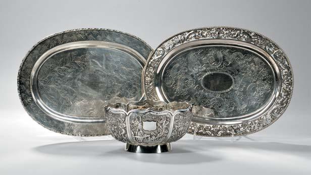 66 68 67 72 71 70 Three Pieces of Chinese Export Silver Tableware, late 19th/early 20th century, a creamer with shallow chased floral medallions, maker s mark WA, ht.