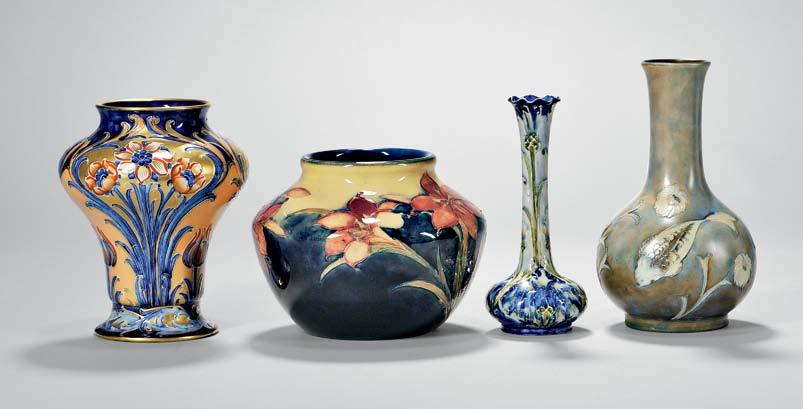 469 470 471 472 469 MacIntyre Moorcroft Alhambra Florian Vase, England, c. 1903, floral decorated in red and blue to a gilt and peach-colored ground, printed mark, ht. 7 1/2 in.
