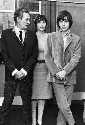 OPPOSITE PAGE: C.C., Mick Jagger and Chrissy Shrimpton, Paris BELOW: Peter Finch, C.C. and Mick Jagger, London Photo by John Beale Back home, London was busy and buzzy and we moved into two floors of Maddox Street W1.