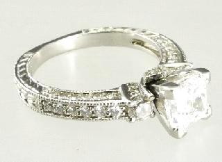$600 - $800 420 Pair of 14k white gold emerald cut diamond
