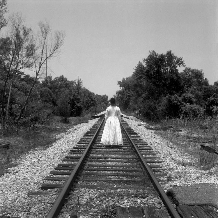Carrie Mae Weems Carrie Mae Weems Untitled (Woman walking along railroad