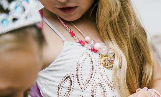 Insert Image or text Our pastel colored, boldly beaded necklaces with character charms are the perfect accessory for glitzy girls.