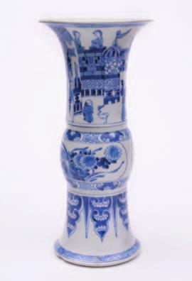 386 384 389 384 A Chinese blue and white beaker vase, gu painted with panels of figures and fortified buildings, the central knopped section with flowers and rockwork, the spreading base with lappet