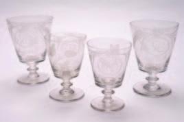 80-120 322 A suite of twelve clear glass rummers in two sizes, of tapering cylindrical form, the bowls engraved with hops and barley around a circular panel around
