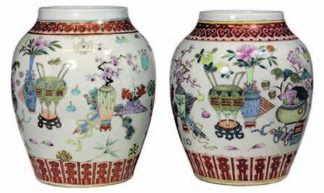 358 358 A Chinese porcelain baluster jar and domed cover finely painted in the famille rose palette with a female figure seated at a rootwood table attended by seven further maids, behind them five