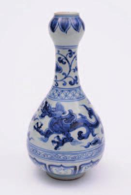 200-300 373 A Chinese-style famille verte baluster vase painted with butterflies and large baskets of flowers, probably French, 34cm high [rim crack, some crazing].