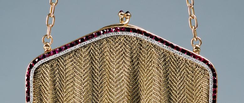 678 Lots 678 and 678A are from the estate of Lionel Hampton, one of the great Swing-era musicians. 678. Edwardian 14kt Gold, Ruby, and Diamond Mesh Purse, set with a row of cushion-cut rubies, and rose-cut diamonds, 175 dwt, no.