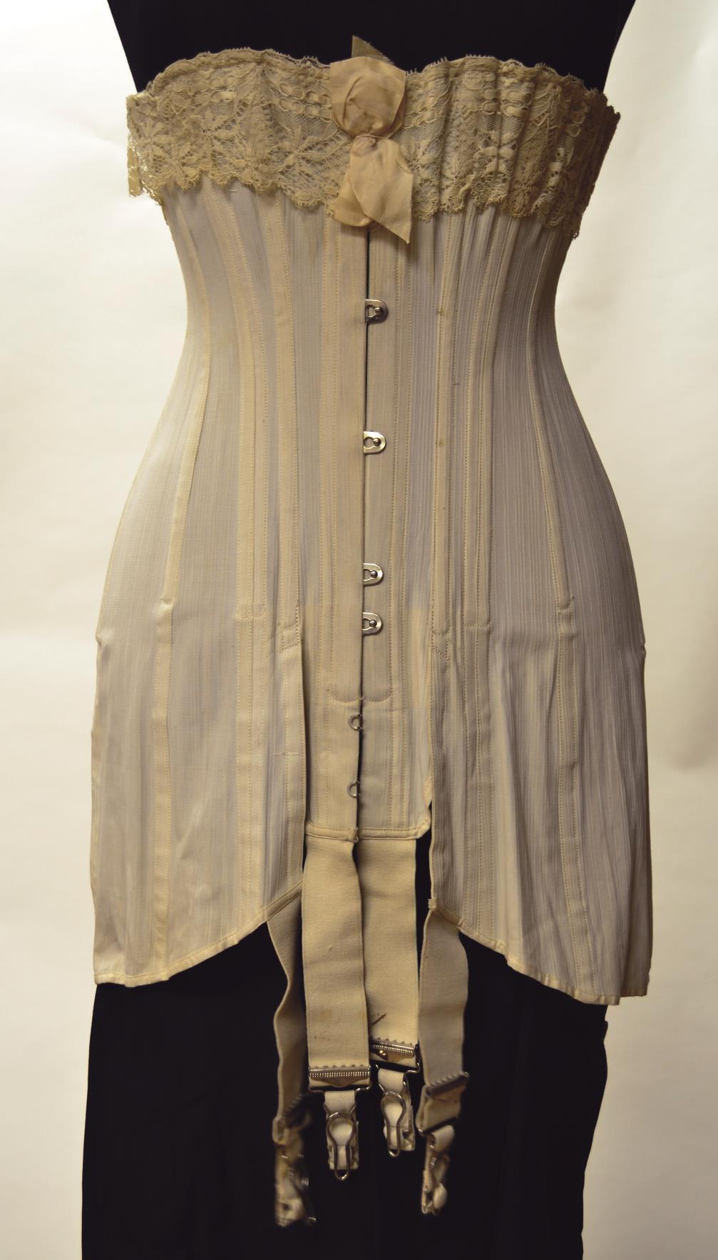 The panels of 1915 Deep Skirted Corset are designed to lengthen the body to create a long