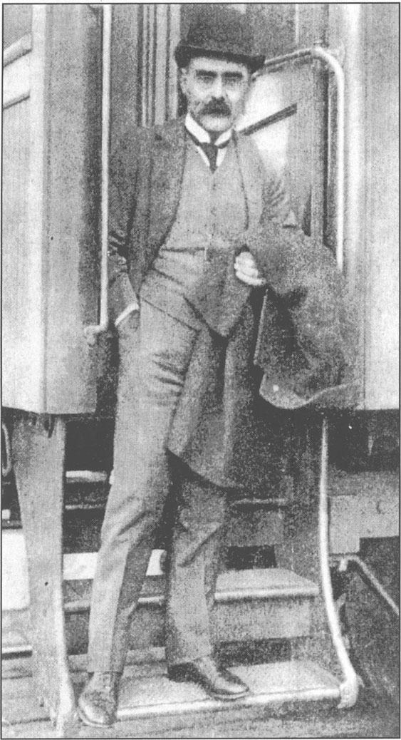 Kipling on the steps of his private rail-car, 'Dalton', in Canada, October 1907.