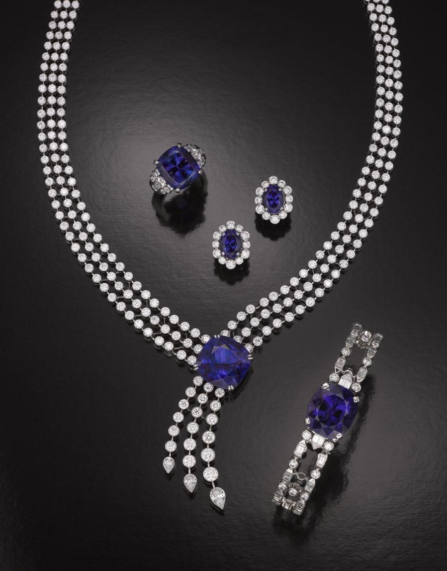 Price upon request. Van Cleef & Arpels tanzanite earrings Features 3.93 and 3.39 ct modified brilliant-cut oval tanzanites, each encircled by 12 round brilliant-cut diamonds.