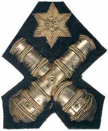 Artillery; 2nd Class Gunnery badge, c1906; also artillery flaming canon badges (2 different types). Fine - extremely fine.