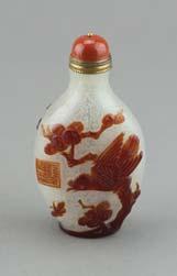 cinnabar-lacquer snuff bottle; featuring figures at courtyard in relief; four-character