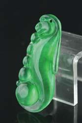 30 140 Chinese Green Jadeite Carved Leaf Chinese emerald green jadeite carved pendant; of leaf form; pierced for suspension; H: 4 cm, W: 2 cm, 13 ;
