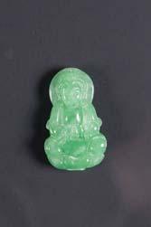 Buddha in relief. The stone of apple green with good translucency. Suspend onto hanging string. H: 4.