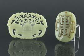 of jade with brown suffusions. H: 4.2 cm, W: 2.4 cm, L: 5.9 cm, 56. Provenance: T. Ng Collection Toronto.