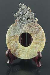 recumbent pose; of translucent white tone; Chinese white jade carved Zigang pendant; of plaque form;