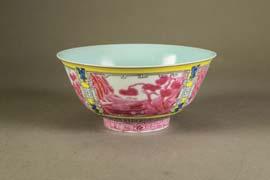 imperial bowl; supported on short foot rim; featuring imperial palace scene in peach-bloom on yellow ground;