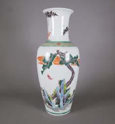00 351A Chinese Export Figures Porcelain Vase Qianlong Chinese export figures vase; of blaster form; featuring blue and white scrolling vines on