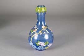 Porcelain Vase Qianlong Chinese Famille Rose double gourd porcelain vase; featuring flowers and birds with a blue band in middle;
