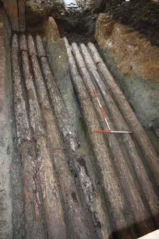 sealed by the backfilling of the mill/moat, with the cut for the pipe-trench only appearing when these dumps were removed, these later pipes were apparent much earlier in the excavation, and were