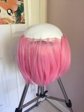 Tip - cut slits into the bottom of the wig so they can stretch/fit over