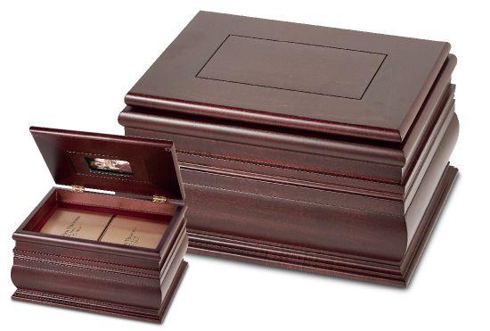 b Eternal Companion Memorabilia Chest 197260 Dual Capacity Measures 14.69"w x 11.63"d x 7.88"h $1,260.00 Crafted in maple with hand-rubbed cherry finish Frameoninterioroflidholdsa3"x4.