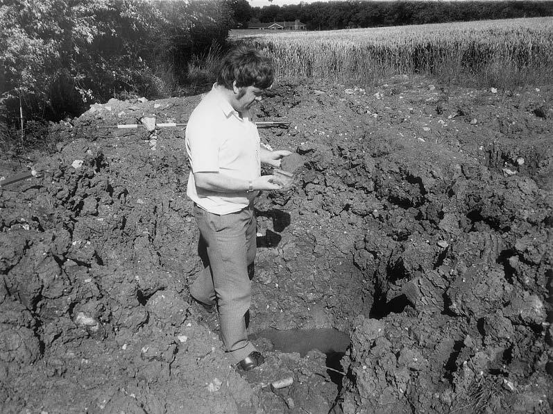 156 Metal Detecting and Archaeology Fig 14.1: John Gower, Joint Honorary Secretary of the Surrey Archaeological Society, examining damage by treasure hunters at Wanborough in 1985.