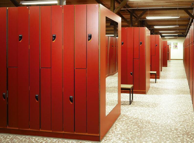 View of the locker rooms with Z-combination lockers. The seating facilities are located between the locker fronts.