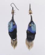 The toxic substances used affect drinking water and have a devastating impact on wildlife and the human population. Red legged honeycreeper earrings, Brazil, c.