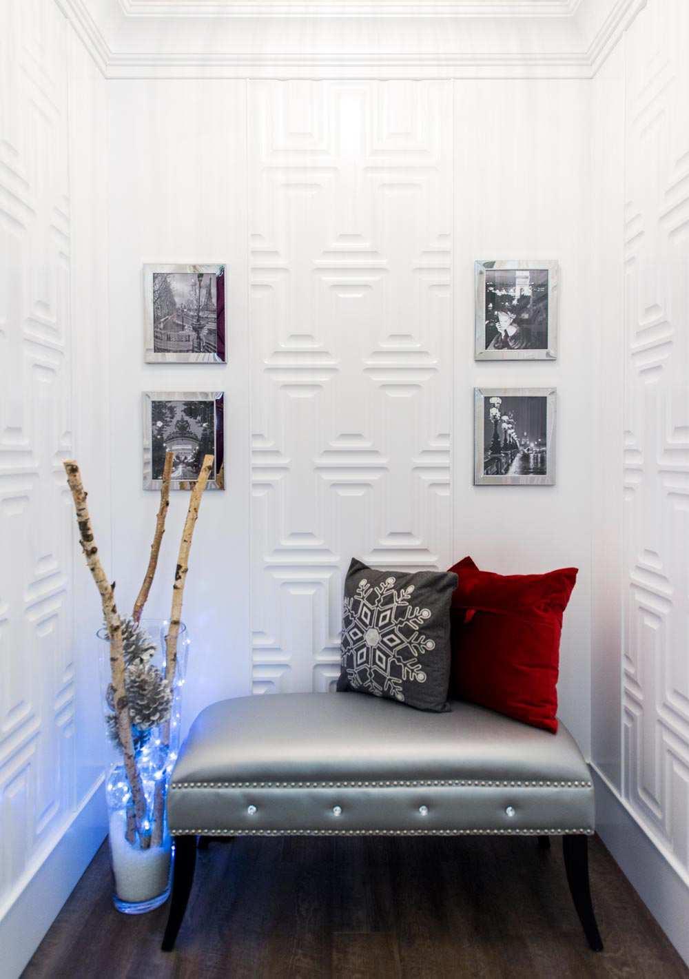 LE PETIT PARIS: Studio J designer Josee Lapalme s room, shown above, is all about the details with textured wall panels offset by a comfortable silver bench and glass and crystal