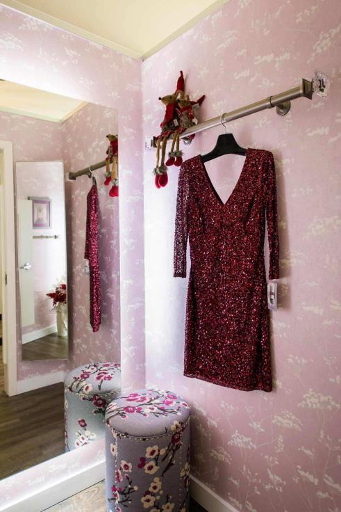 SIMPLY LUXE: Designers Jan Reid and Brenda Martin of Luxe Home Interiors used pretty-in-pink wallpaper in their design.