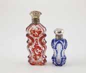 1132 1133 1134 1100b 1122 1137 1131 1140 1141 1142 1133 Three Ceramic Scent Flasks 2 moonflask form, the larger painted with a geisha in a landscape, the two others with floral decoration, all with