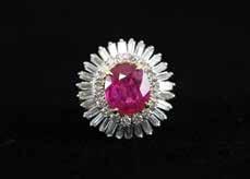 J22 18ct 45stone Ruby & Diamond Cluster Ring raised central four claw set oval mixed cut ruby with individual set surround of 16
