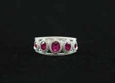 24cts 18 Replacement $14,500 $4,000-5,000 J23 18ct White Gold 129stone Ruby & Diamond Ring oval mixed cut five graduated rubies,