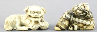 465 Two small Inuit carvings, one a hunter.